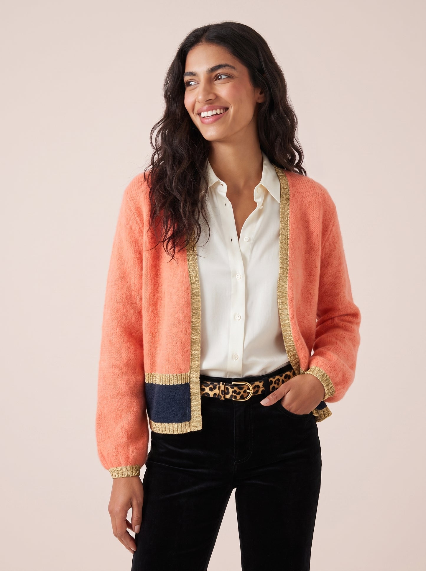 Sophie cardigan in orange with deep navy stripe and gold lurex trim along the open front cuffs and hem by Cosy Em