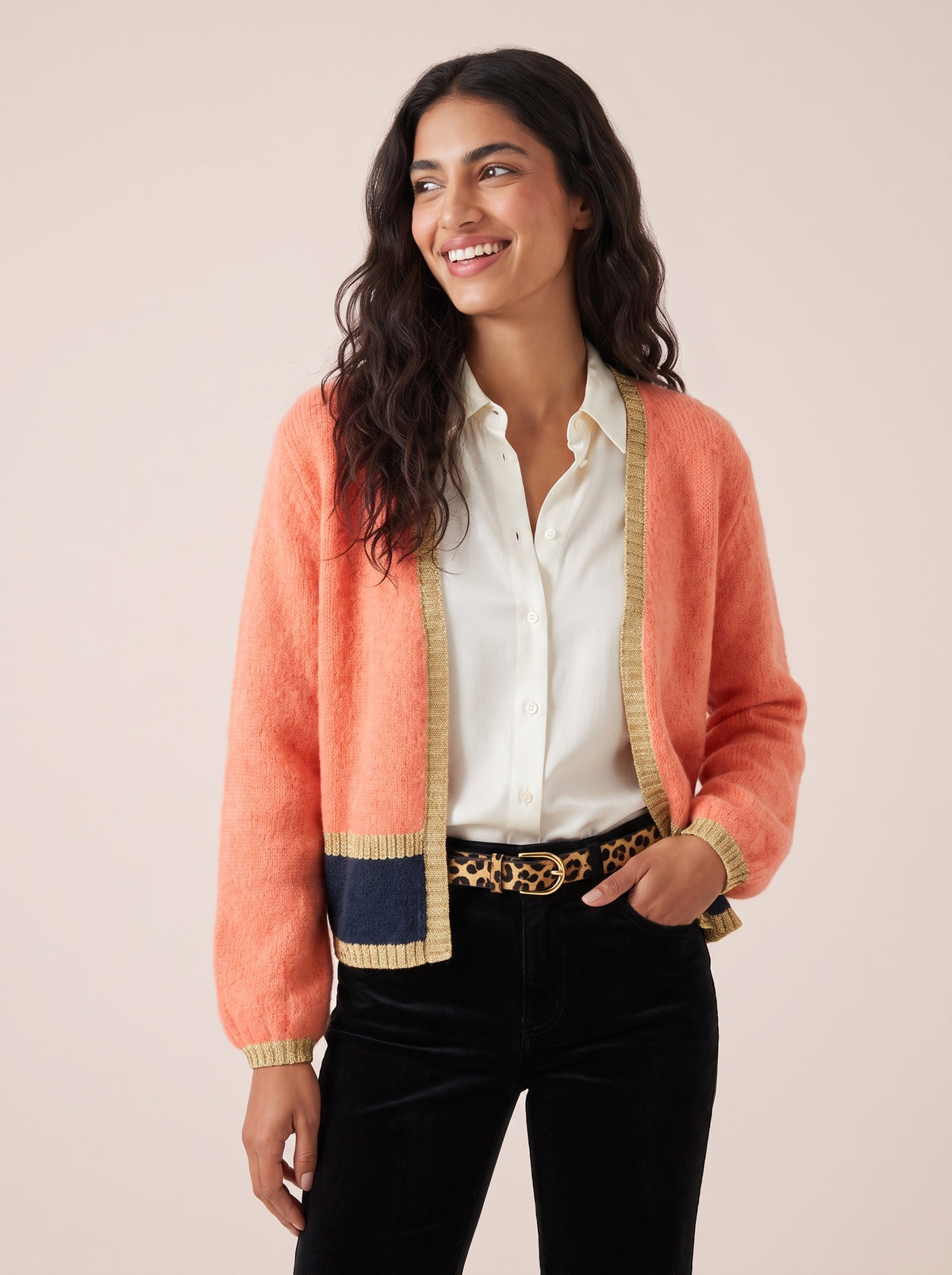 Sophie cardigan in orange with deep navy stripe and gold lurex trim along the open front cuffs and hem by Cosy Em
