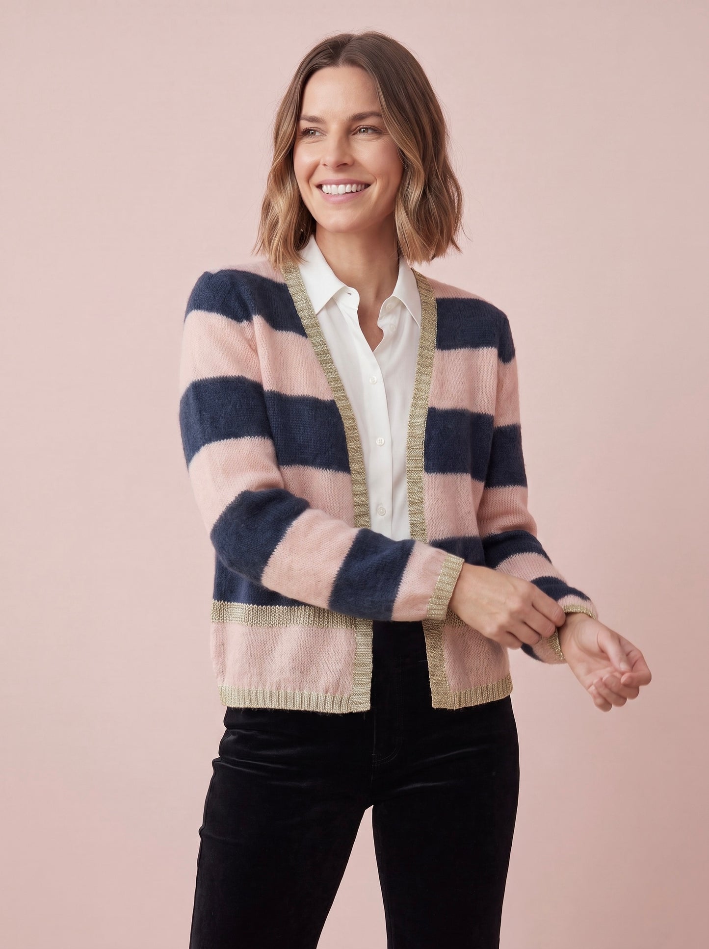 Sophie Navy and blush pink striped mohair and merino blend cardigan with a V-neck open front and gold lurex trim along the cuffs and hem by Cosy Em