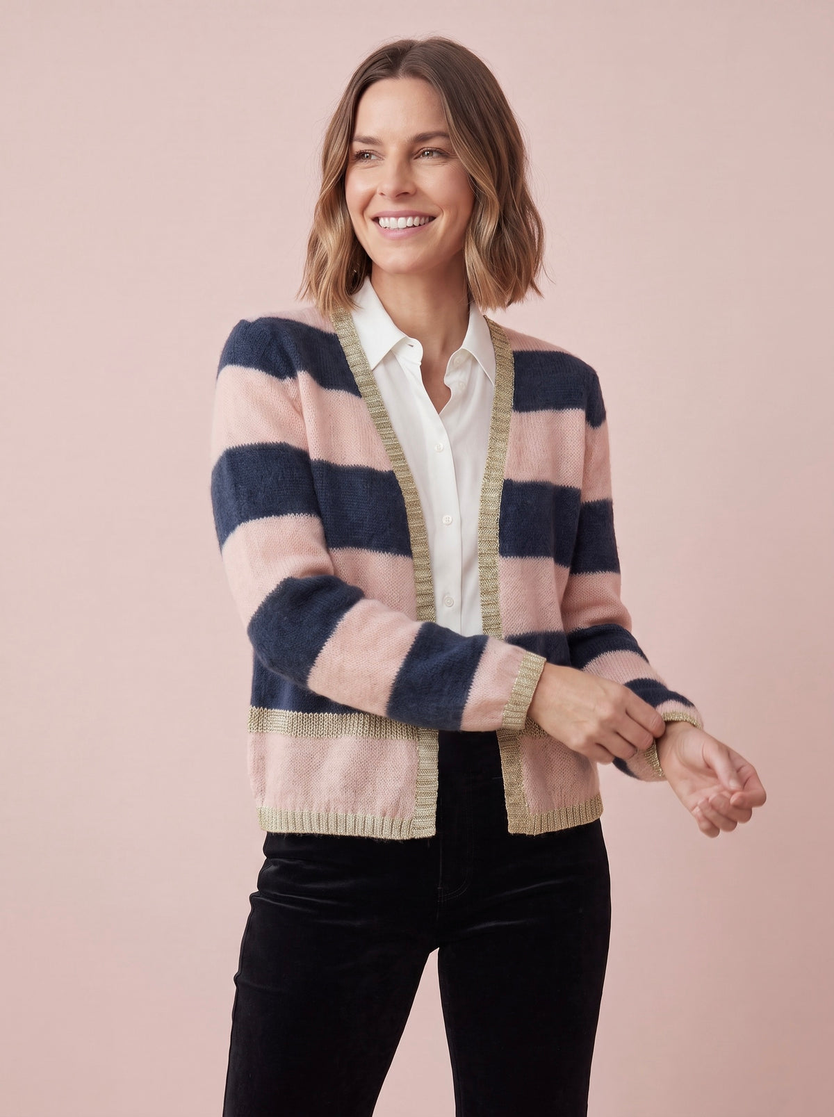 Sophie Navy and blush pink striped mohair and merino blend cardigan with a V-neck open front and gold lurex trim along the cuffs and hem by Cosy Em