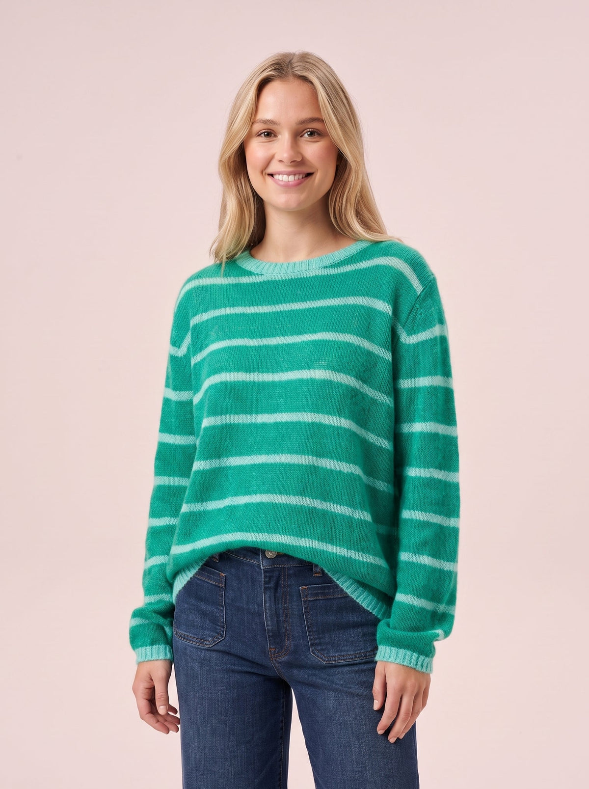 Emerald green cosy knit jumper with turquoise blue horizontal stripes and ribbed crew neck cuffs and hem in a relaxed fit