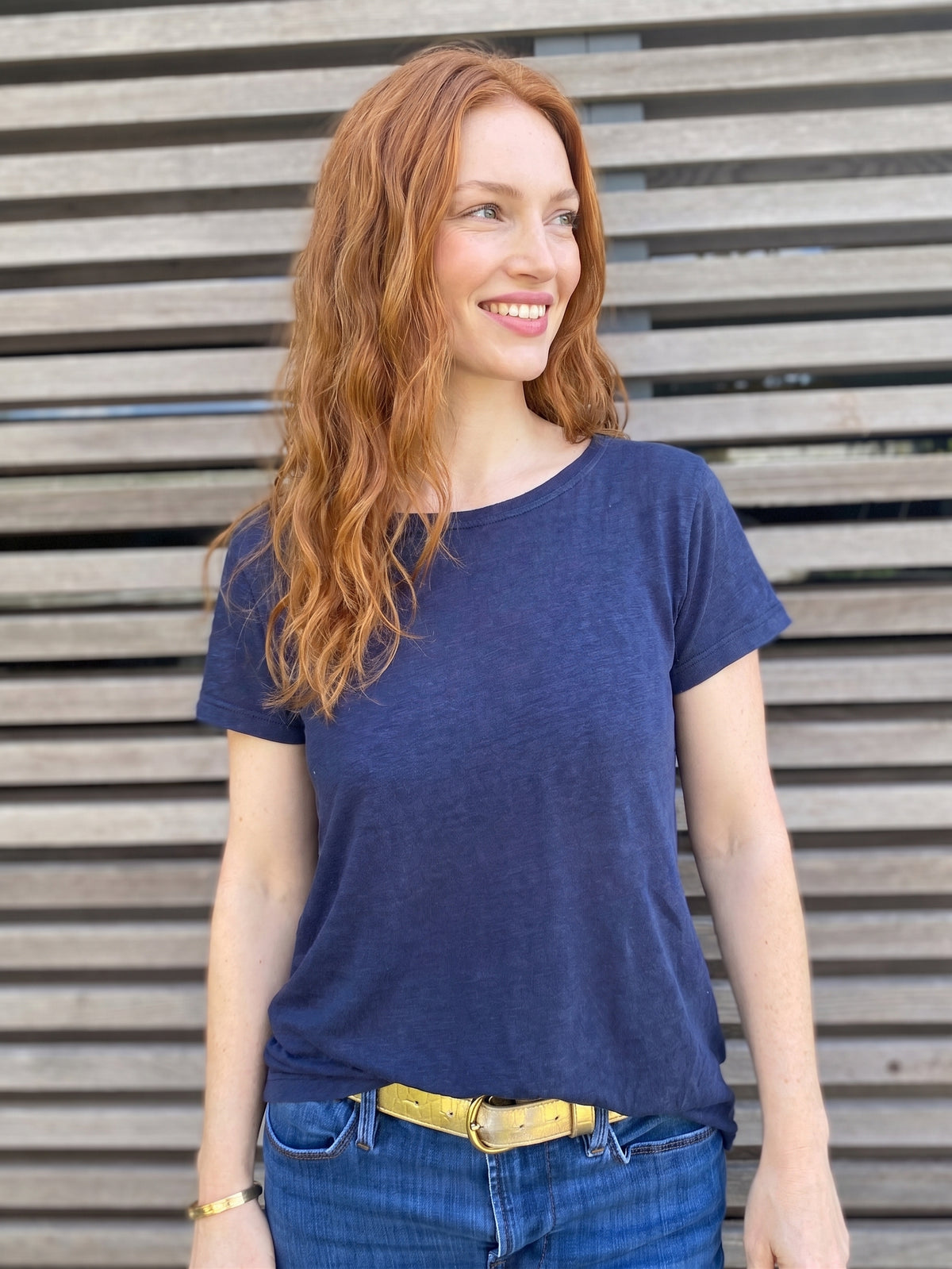 Navy blue short sleeve linen top with a round neckline and relaxed fit