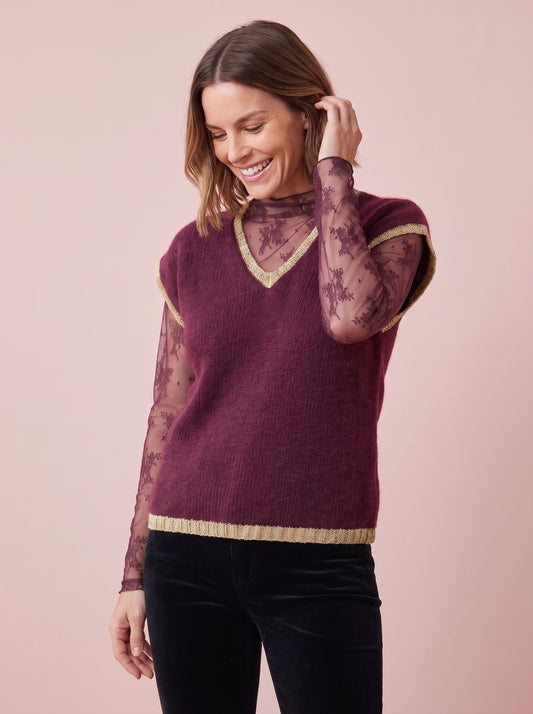 Burgundy wine red knitted tank top with a V-neck and gold lurex trim around the neckline armholes and hem